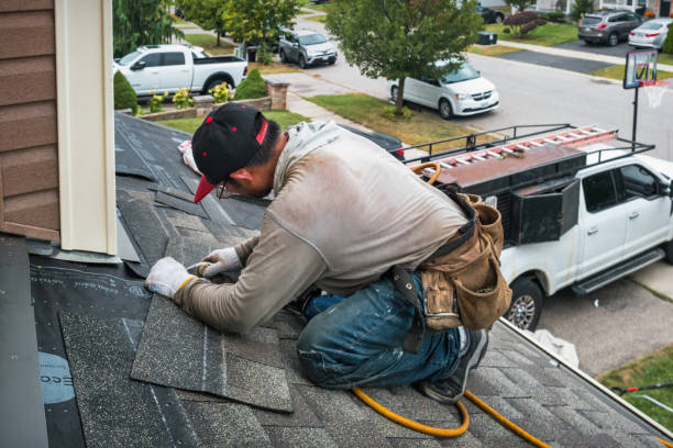Professional Roof Replacement technician working in Highland Lake, NY